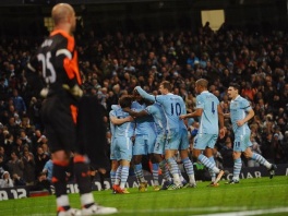 Igrači Manchester Cityja slave pogodatk (Foto: AFP)