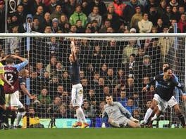 Lescott postiže gol (Foto: AFP)