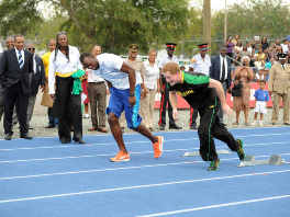 Usain Bolt i princ Harry (Foto: AFP)