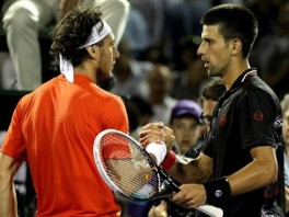 Novak Đoković i Juan Monaco (Foto: AFP)