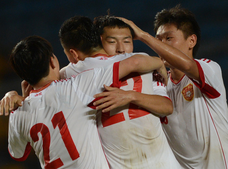 Reprezentativci Kine slave gol protiv Indonezije (Foto: AFP)