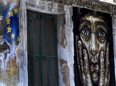 Grafit na ulicama Atine (Foto: EPA)
