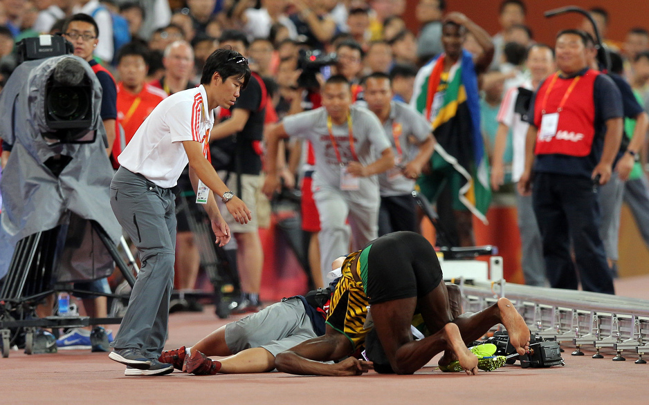 Usain Bolt na podu (Foto: AFP)