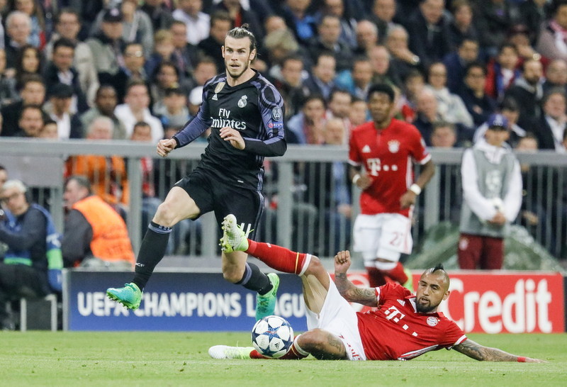 Gareth Bale (lijevo) zbog povrede neće nastupiti protiv Bayerna u uzvratnom meču četvrtfinala Lige prvaka (Foto: EPA)