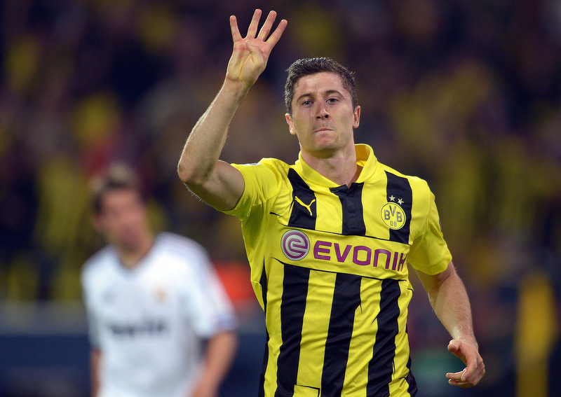 Robert Lewandowski u dresu bivšeg kluba B. Dortmund proslavlja svoj četvrti gol protiv Real Madrida u polufinalu Lige prvaka 2013. godine (Foto: EPA)