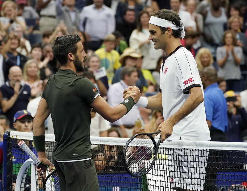 Džumhur je ove godine igrao i s Federerom (Foto: EPA-EFE)
