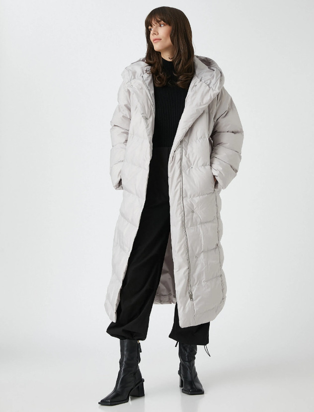 Model duge puffer jakne u Kotonu