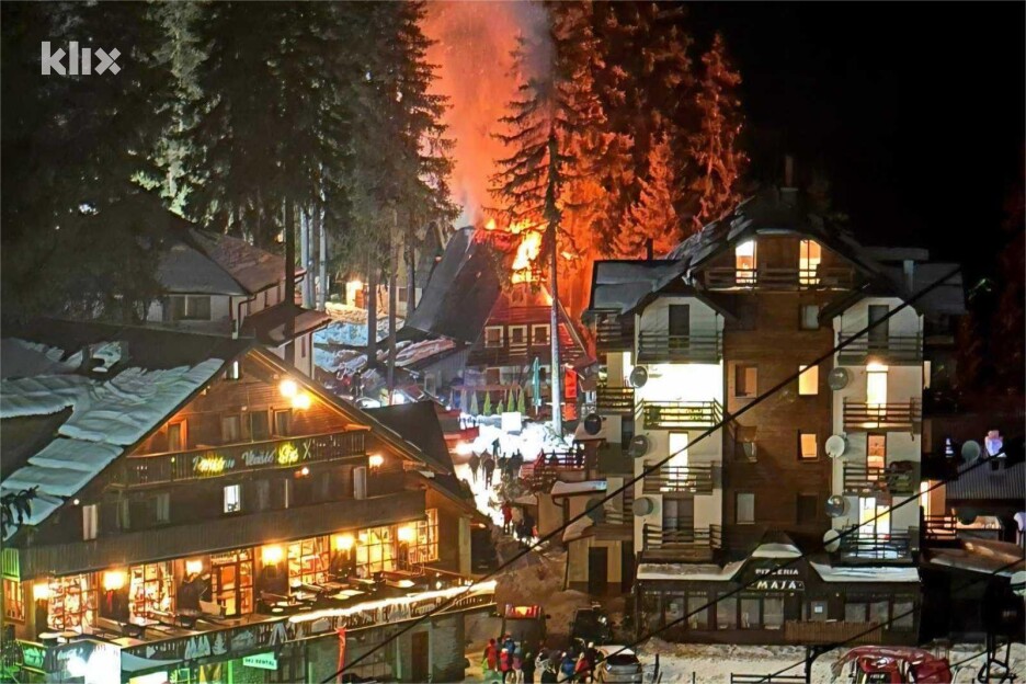 Vikendica okružena gustom šumom