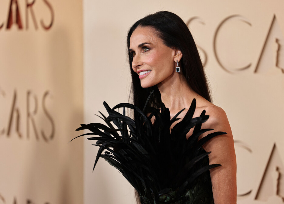Demi Moore nosila je Gucci haljinu prekrivenu perjem (Foto: Reuters)