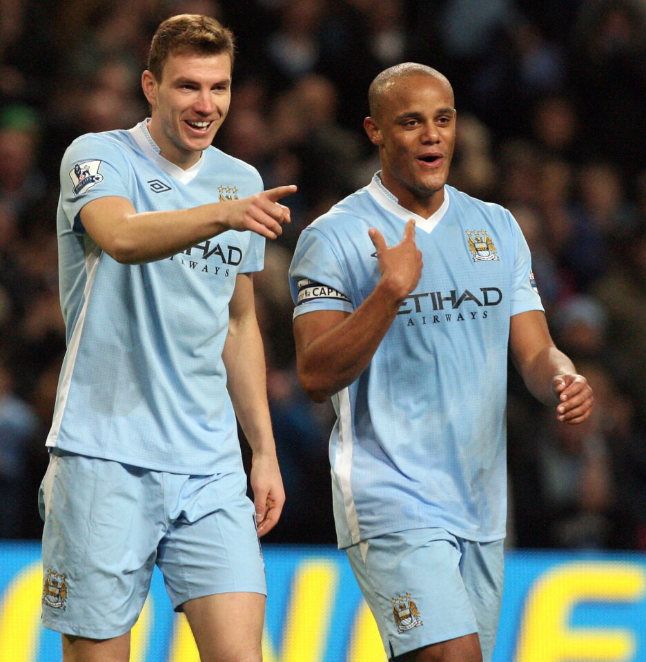 Džeko i Kompany dok su dijelili svlačionicu u Manchester Cityju (Foto: EPA-EFE)