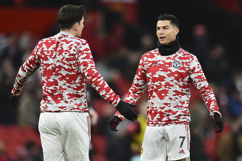 Harry Maguire i Cristiano Ronaldo (Foto: EPA-EFE)