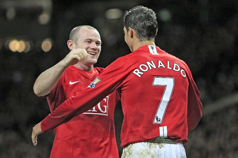 Wayne Rooney i Cristiano Ronaldo u vrijeme dok su zajedno igrali za Manchester United (Foto: EPA-EFE)