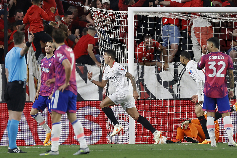 Erik Lamela slavi pobjednički gol Seville protiv Juventusa (Foto: EPA-EFE)
