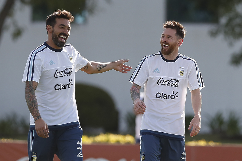 Ezequiel Pocho Lavezzi i Lionel Messi (Foto: EPA-EFE)
