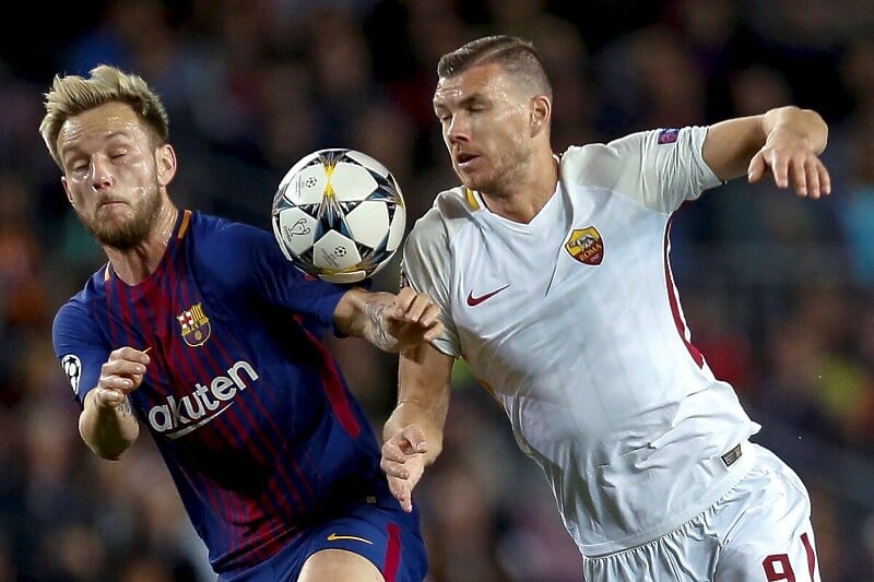 Ivan Rakitić i Edin Džeko iz perioda dok su nastupali za Barcelonu i Romu (Foto: EPA-EFE)