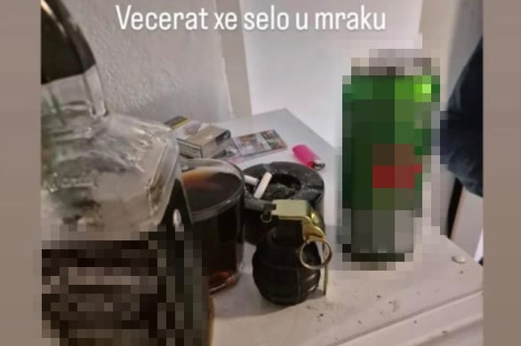 Na slici je prikazan sto sa alkoholnim pićima i ručnom bombom, uz opis: "Večerat će selo u mraku"