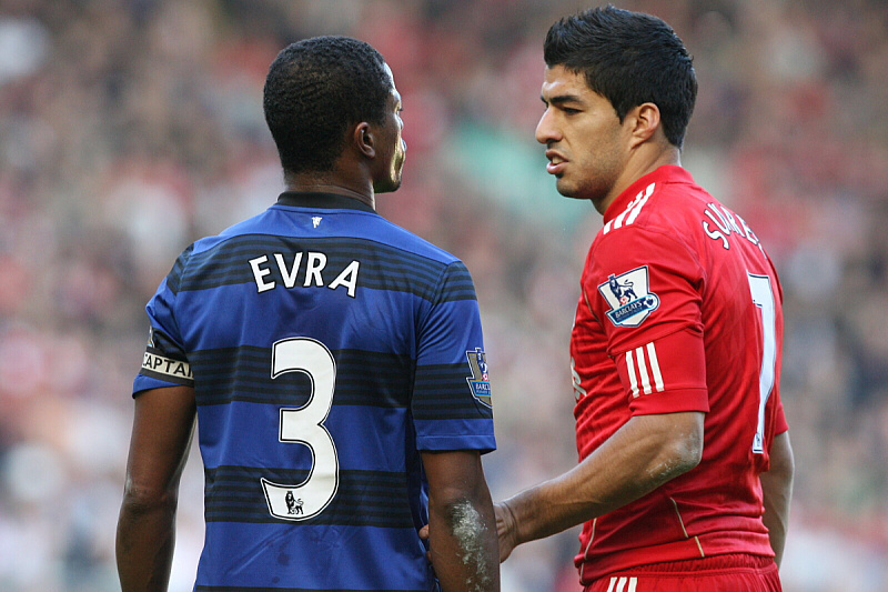 Patrice Evra i Luis Suarez (Foto: EPA-EFE)