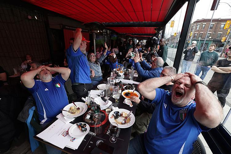 A Photo for History: Italians in Despair, While Two Bosnians Celebrate in the Heart of "Little Italy" in Toronto