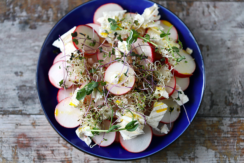 Prepare a simple salad of radishes and spring onions.