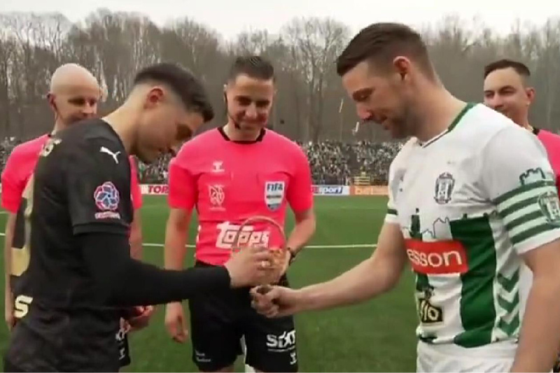 In Lithuania for Easter, instead of tossing a coin, the team whose captain wins the egg tapping competition gets the ball.