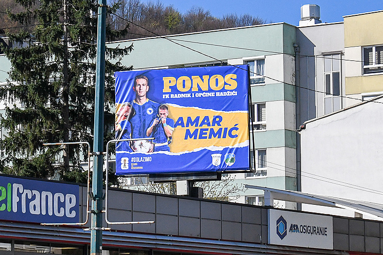 The center of Hadžići is now adorned with a billboard of Amar Memić.