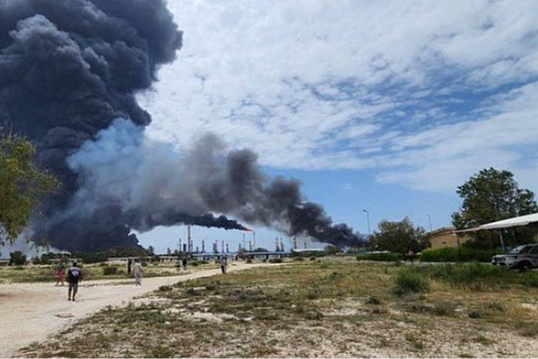 Multiple explosions reported in Iran, one of them at the Lavan refinery.