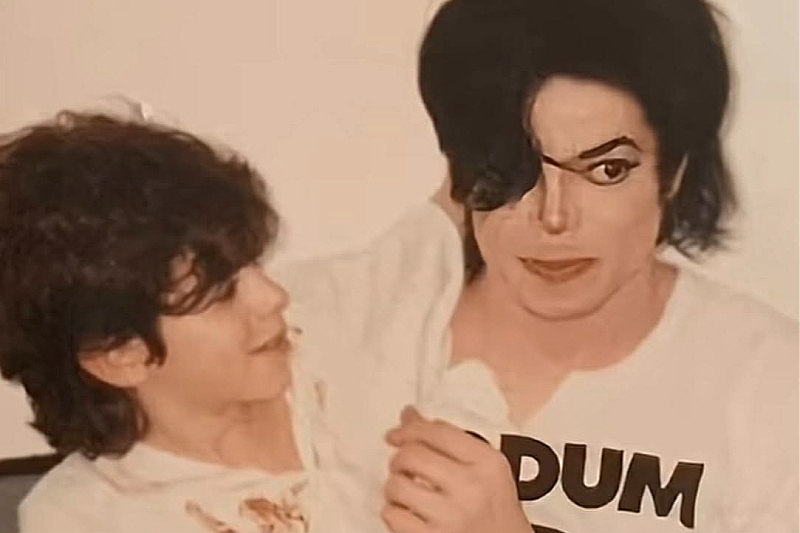 Michael Jackson posthumously accused of child rape: Previously unseen photos with a boy released.