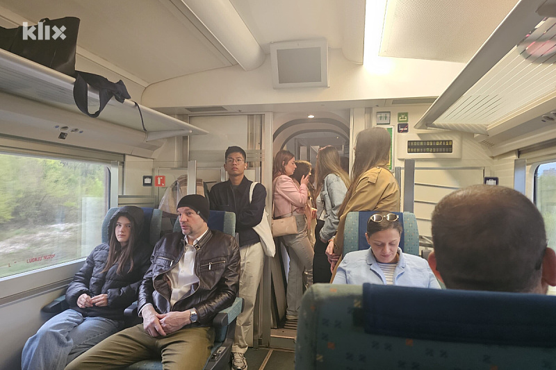 New tourist season, old problems: Passengers stand on the train from Sarajevo to Mostar due to more passengers than seats.