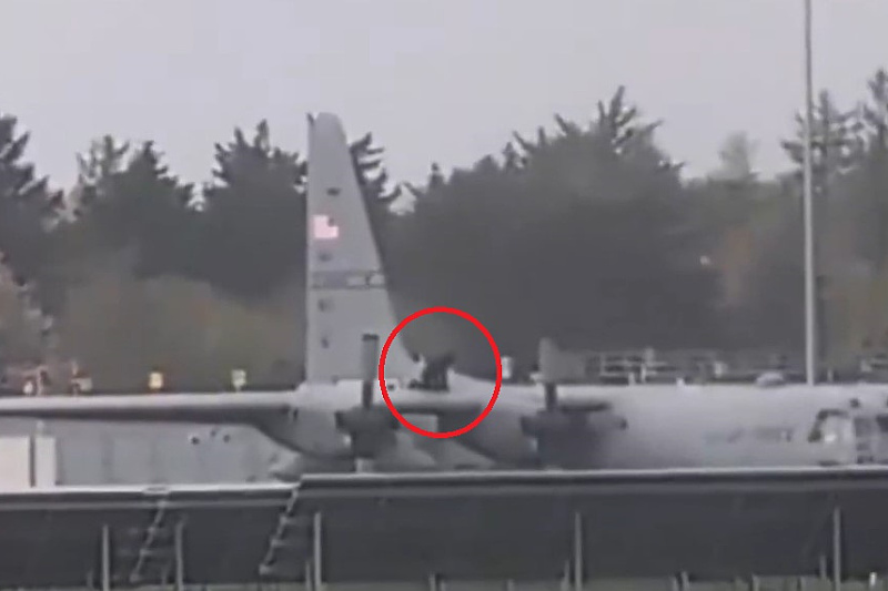 A man climbed onto a U.S. military aircraft at an airport in Ireland and damaged it with an axe.