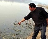 Kina: Srceparajuća fotografija novorođenčeta bačenog u rijeku