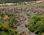 Fotografije kataklizme u BiH: Iz dubokog mulja samo krovovi vire