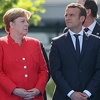 Merkel: Odlučno uz Britaniju, Macron: Ranjeno dvoje Francuza