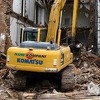 Zelena površina sa klupama i fontanom nakon rušenja stambene zgrade pored hotela Bristol