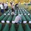 Tabuti s posmrtnim ostacima 86 prijedorskih žrtava stigli na stadion u Hambarinama
