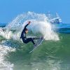 Surfer riskirao život kako bi snimio momenat kada su ga okružili morski psi