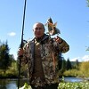 Nešto drugačiji imidž: Kremlj objavio Putinove fotografije sa pecanja u Sibiru