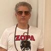 Zvijezda serije "The Sopranos" uz sijedu kosu i naočale izgleda neprepoznatljivo