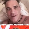Robbie Williams se za intervju javio iz kreveta pa priznao da je potpuno go