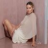 Heidi Klum u prirodnom izdanju i prozirnoj odjeći na naslovnici magazina Vogue