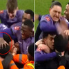 Navijač Liverpoola utrčao na proslavu, njegovi igrači ga izudarali po glavi